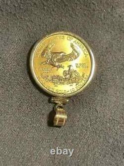 Pendentif de pièce d'aigle américain en argent sterling 925 avec finition en or jaune 14 carats.