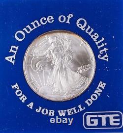The translation of the title in French is: 
 <br/>'1994 American Silver Eagle Vintage GTE Display 1oz Silver. 999 ASE SAE $1'